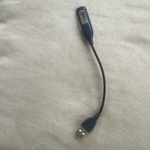 Charger for fit bit plugs to usb port